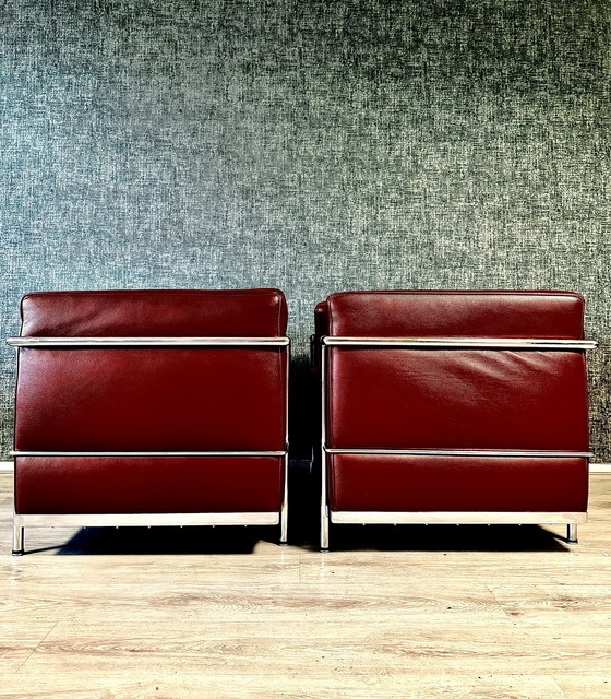 Image 1 of 2 vintage LC2 Le Corbusier stoelen in rood leer, Italië, jaren 80