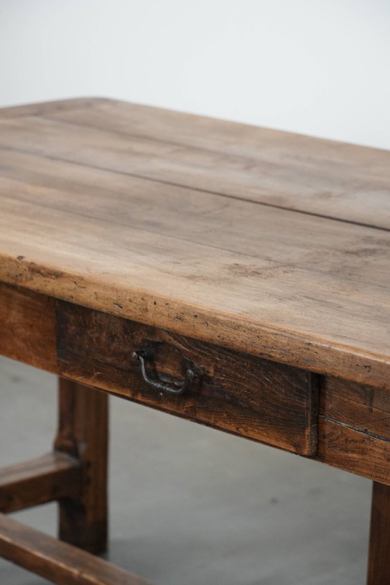 Image 1 of Robust antique French 6-person dining table made of fruit wood with 3 drawers from the late 18th century
