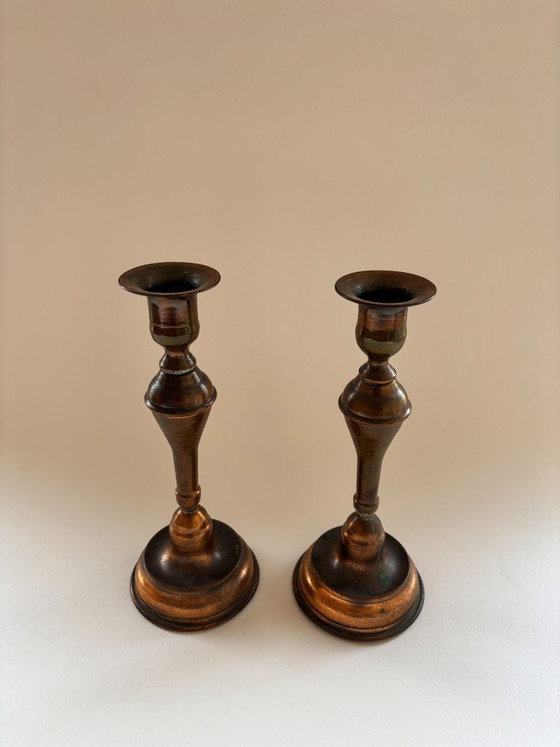 Image 1 of Een paar vintage koperen kandelaars