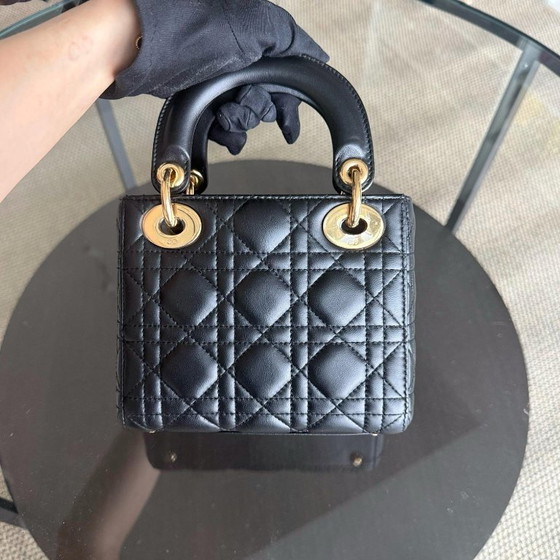 Image 1 of DIOR LADY MINI - PELLE DI AGNELLO CANNAGE, DETTAGLI IN ORO NERO, CINTURINO REGOLABILE