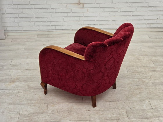 Image 1 of Anni '60, poltrona danese in velluto rosso ciliegia.