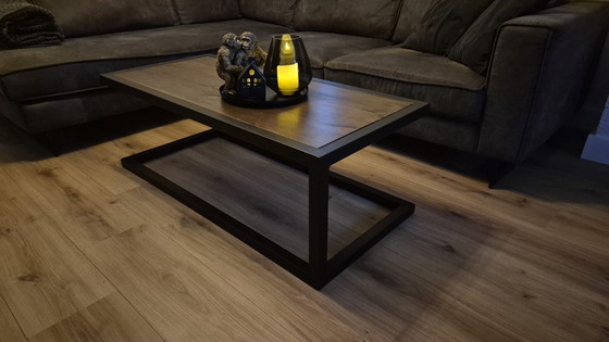 Image 1 of Table basse design 120x60 cm – Structure en C flottante artisanale – Acier et bois