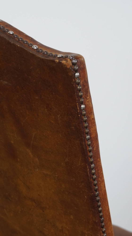 Image 1 of Satz von 2 antiken Esszimmerstühlen aus Holz und Schafsleder aus den frühen 1900er Jahren