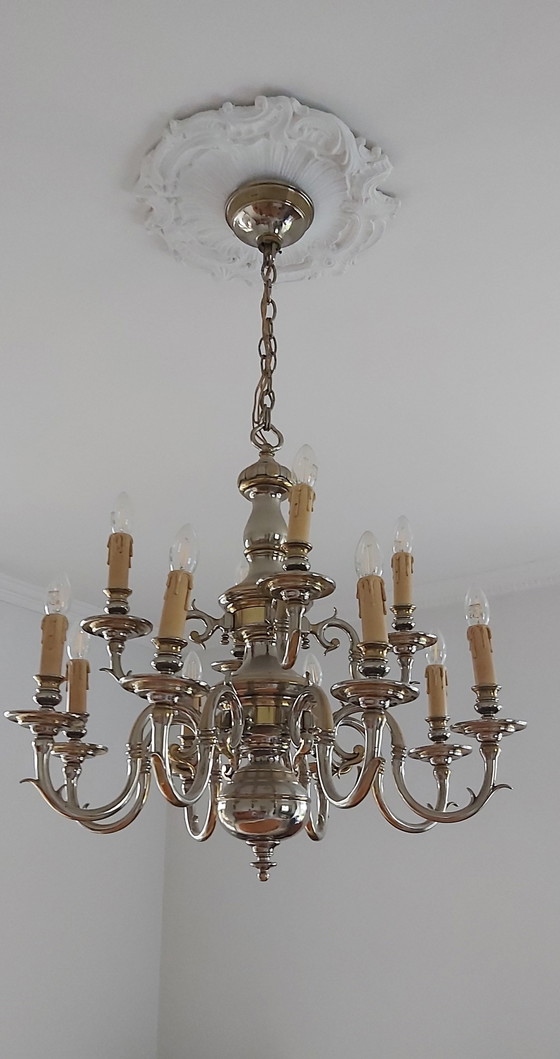 Image 1 of beautiful lusters bronze with silver
patinated.
MOD DEP LAMP ART
12 arms and 8 arms.