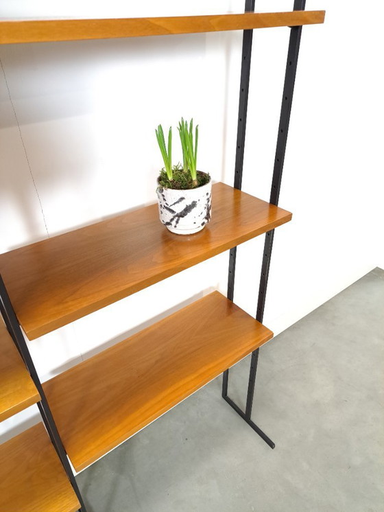 Image 1 of Parete componibile Omnia, Hilker, teak e acciaio nero con ripiani e mobiletto