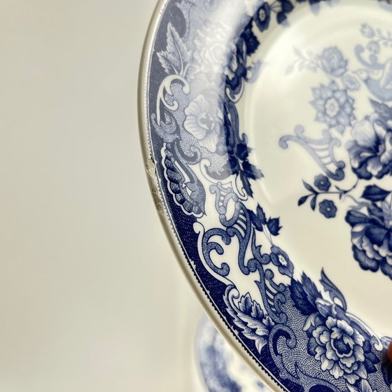 Image 1 of Set of 8 blue earthenware dinner plates with floral and bird decoration, early 20th century