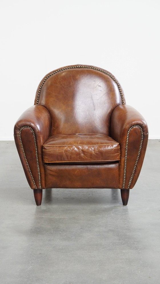 Image 1 of Rundleren design fauteuil/ armchair met ronde vormen en siernagels