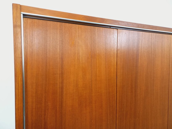 Image 1 of Vintage Scandinavische modernistische kledingkast van teakhout en metaal uit de jaren 60.