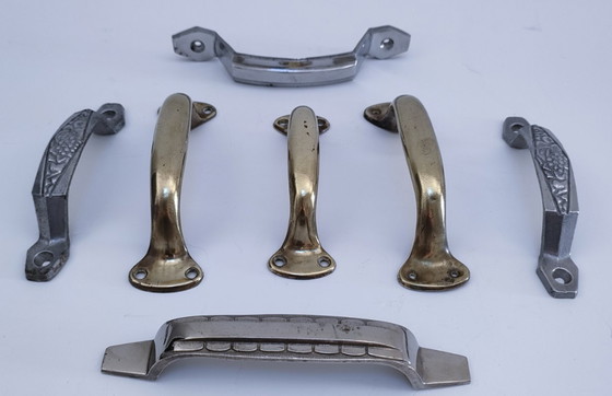 Image 1 of sette maniglie Art Déco in argento e ottone