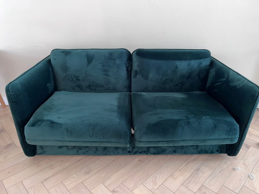 Grüne Schlafcouch
