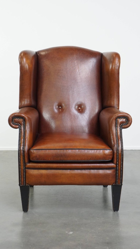 Image 1 of Grote vintage schapenleren oorfauteuil