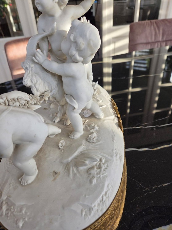 Image 1 of Sculpture - Biscuit - Groupe avec Puttis et bouc de la fin du 19ème siècle (ref 3770)