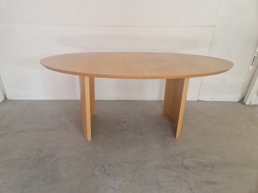 Postmodern extendable dining table