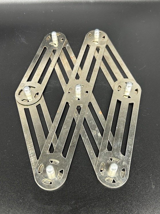 Image 1 of 1950s metal trivet