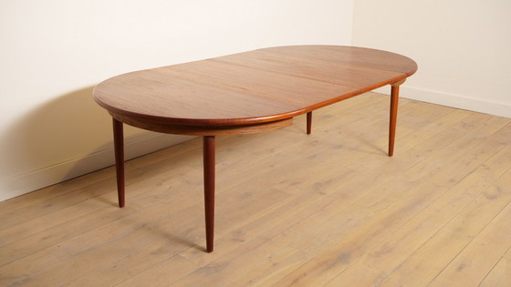 Image 1 of Table de salle à manger ronde vintage | extensible | teck | 130 - 240 cm