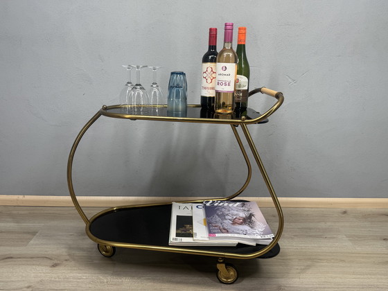 Image 1 of Vintage serving trolley with smoked glass tops