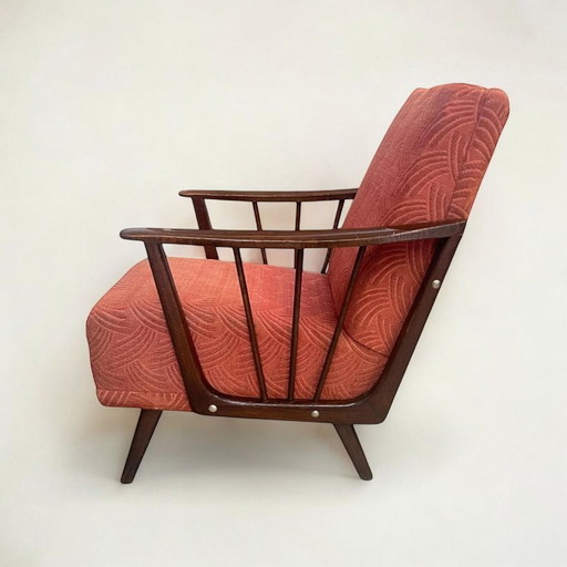 Vintage cocktail/lounge chair with walnut armrests and original red fabric cover. Classic from the 1950s / 60s