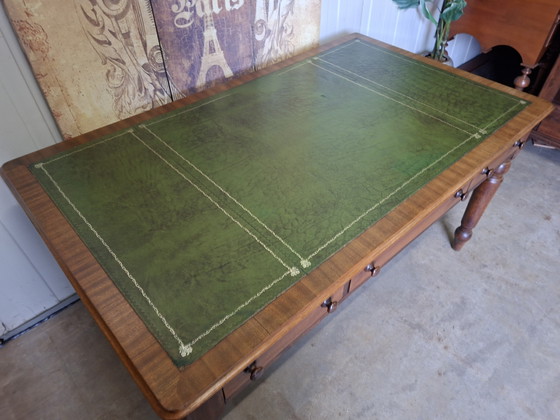 Image 1 of Antique English writing desk, desk with drawers and inlaid leather.

Dimensions 150x90cm and 76cm high.