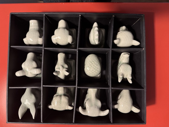 Image 1 of Pols Potten porseleinen chinese direnriem beeldjes