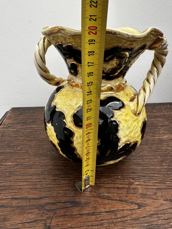 Image 1 of Vase boule jaune et noir rehaussé or attribué Vallauris h 20 cm