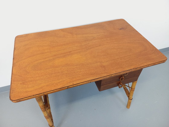 Image 1 of Vintage Louis Sognot bureau in rotan en hout uit de jaren 60