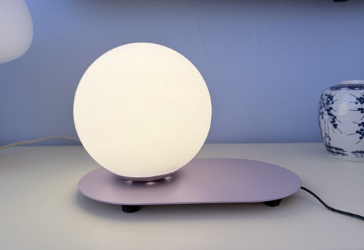 Vintage globe lamp on a plateau