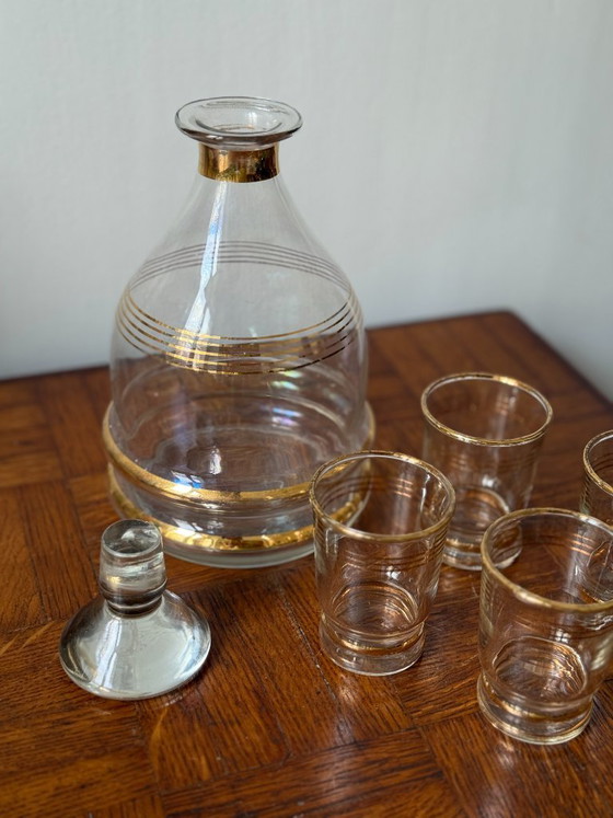 Image 1 of Art Deco style decanter and 8 gold-rimmed liqueur glasses