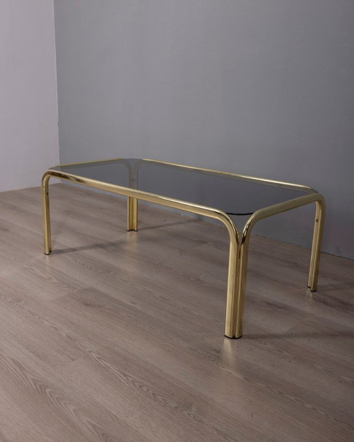 Vintage 1970s Italian-design coffee table in gilded brass and smoked glass 