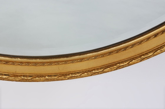 Image 1 of Oval shaped carved gilded Baroque mirror with beveled glass, Belgium  
