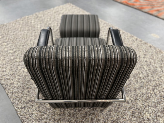 Image 1 of Leolux Scylla high armchair with Belluno fabric pouf in gray leather
