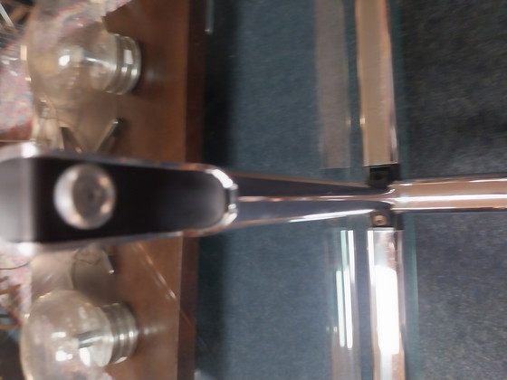 Image 1 of 1 table basse Ums Haller en chrome et verre