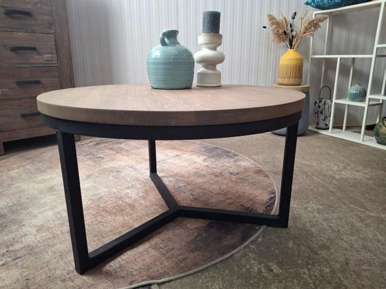 Image 1 of Robust coffee table made of solid oak and metal base