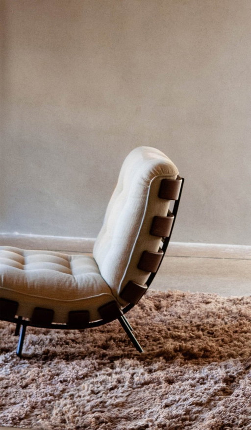 Sillón Costela y otomana Tacchini