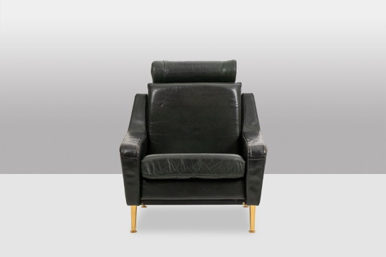 Image 1 of Airborne. Een paar groene leren fauteuils. Jaren 50.