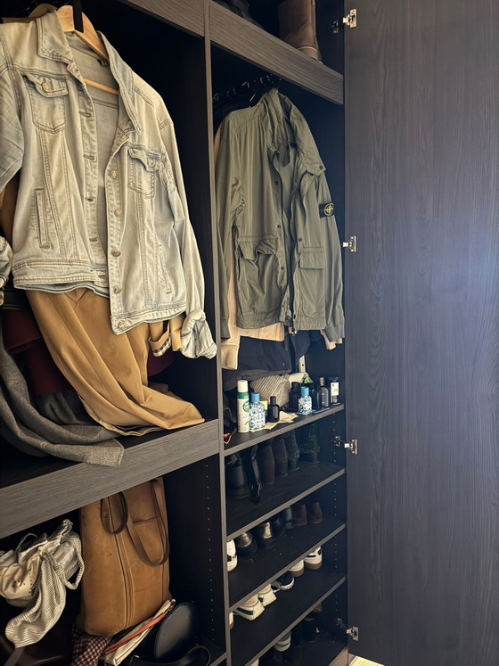 Image 1 of Custom-made wardrobe / clothes cupboard in brown/black wood. 260 high