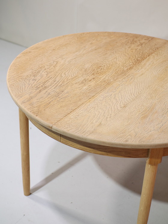 Image 1 of Extendable dining table Henning Kjaernulf oak Danish