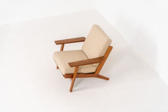 Image 1 of Vroege GE-290 loungestoel in eikenhout van Hans J. Wegner voor Getama (Denemarken, 1953).