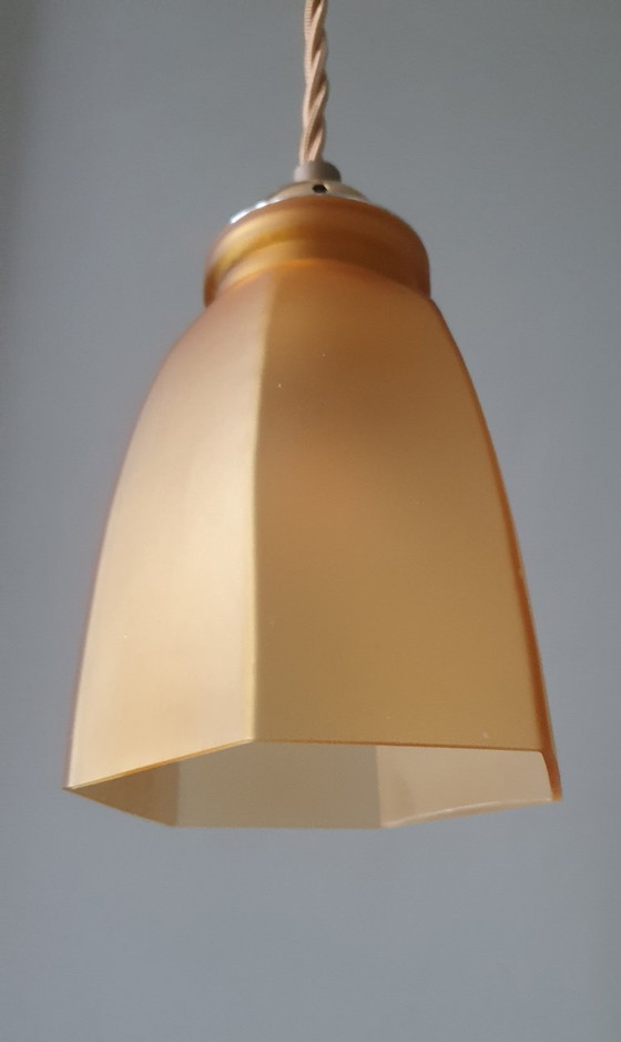 Image 1 of Set Vintage franse gele hanglampen van gekleurd glas.