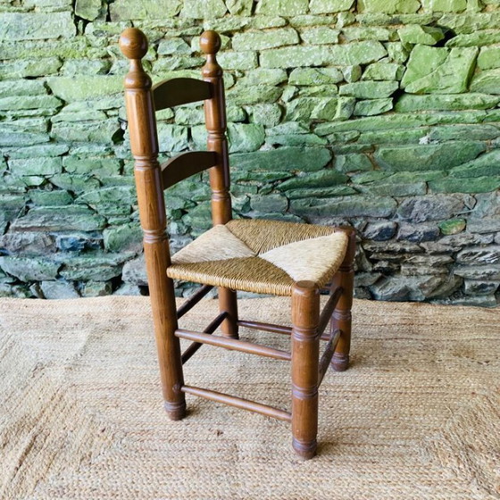 Image 1 of Set van 4 massief houten stoelen met rieten zittingen