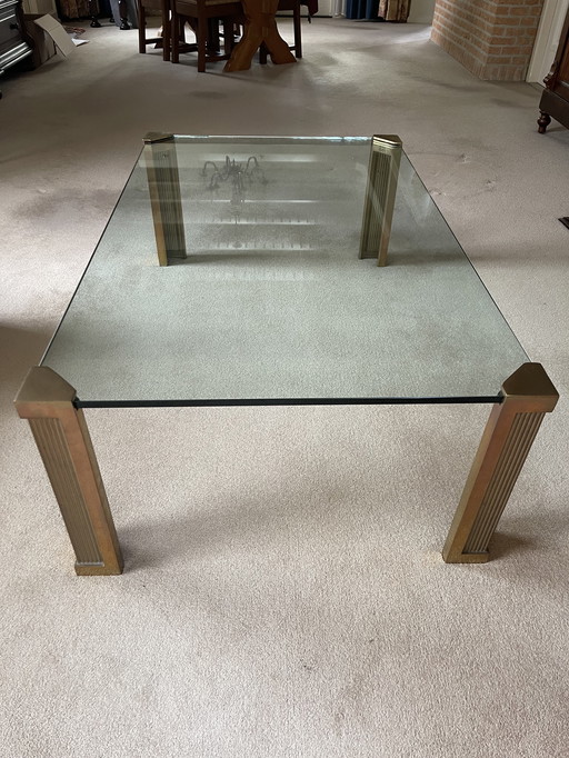 Schitterende salontafel met zware messing poten 