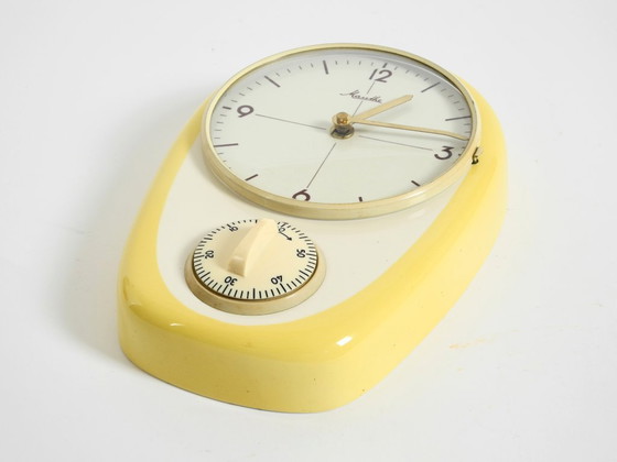 Image 1 of Beautiful battery-operated Mid-Century Modern wall clock by Mauthe with a glazed ceramic case