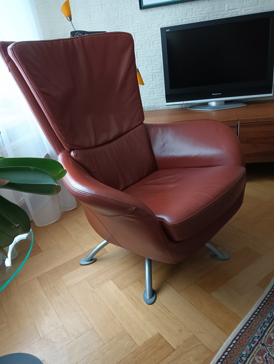 Image 1 of 2 leather armchairs for sale, 360° swivel, beautiful metal base