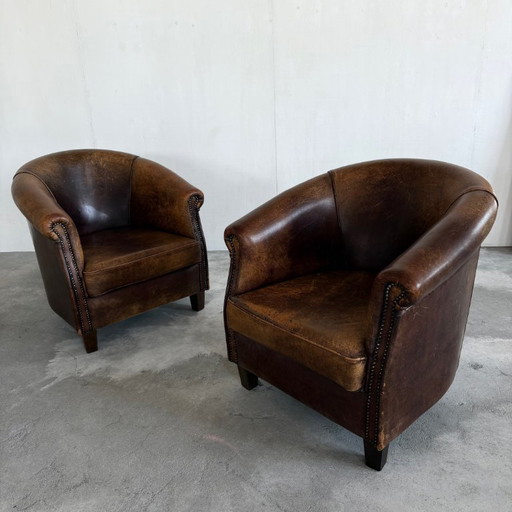 2 Fauteuils en peau de mouton de style Art Déco