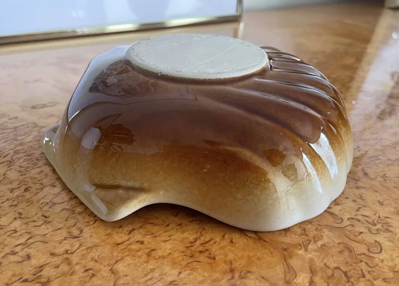 Image 1 of Brown shell saucer