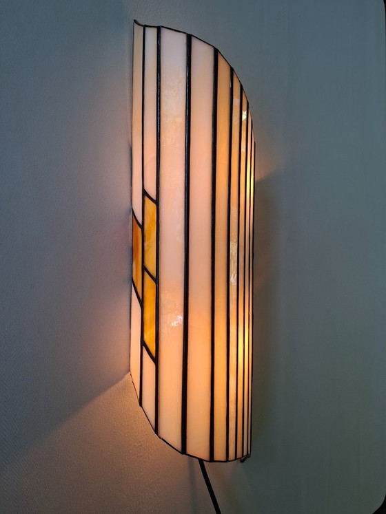 Image 1 of Tiffany  wandlamp met gekleurd glas in zwart koperband  Art Deco