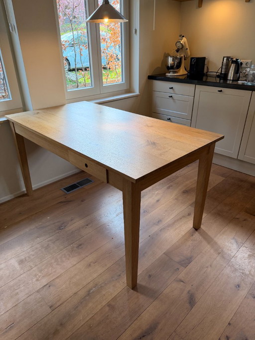 Solid Oak dining table with drawer "framstyle"