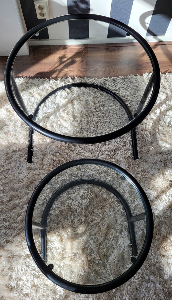 Image 1 of Post-Modern tubular frame nesting tables in black.