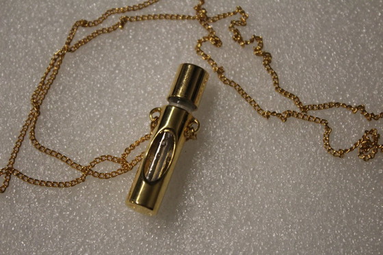 Image 1 of Jovan parfumhanger met ketting, goudkleurig, met glazen flesje, vintage, zeldzaam