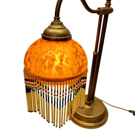 Image 1 of Vintage beaded lamp on a brass base