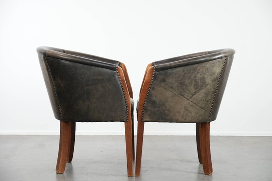 Image 1 of 2 sedie a vasca in pelle di mucca e legno con una bella e robusta combinazione di colori